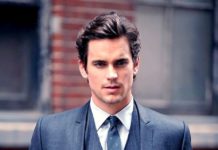 ネクタイを締めてバシッと決めた胸板ホルダーのスーツ姿7選